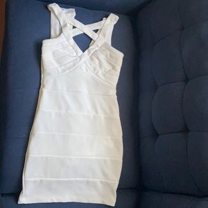 I am selling a white dress by Emerald Sundae